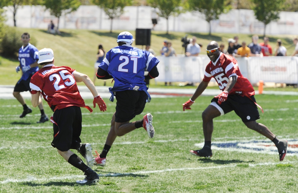 "Dallas" stars Jesse Metcalfe (L) and Josh Henderson (2nd L) with former NFL players Deion Sanders (21) and Derrick Brooks (R) at the EA SPORTS Madden NFL 13 Pigskin Pro-Am on June 22 2012 in Chicago, Illinois.
